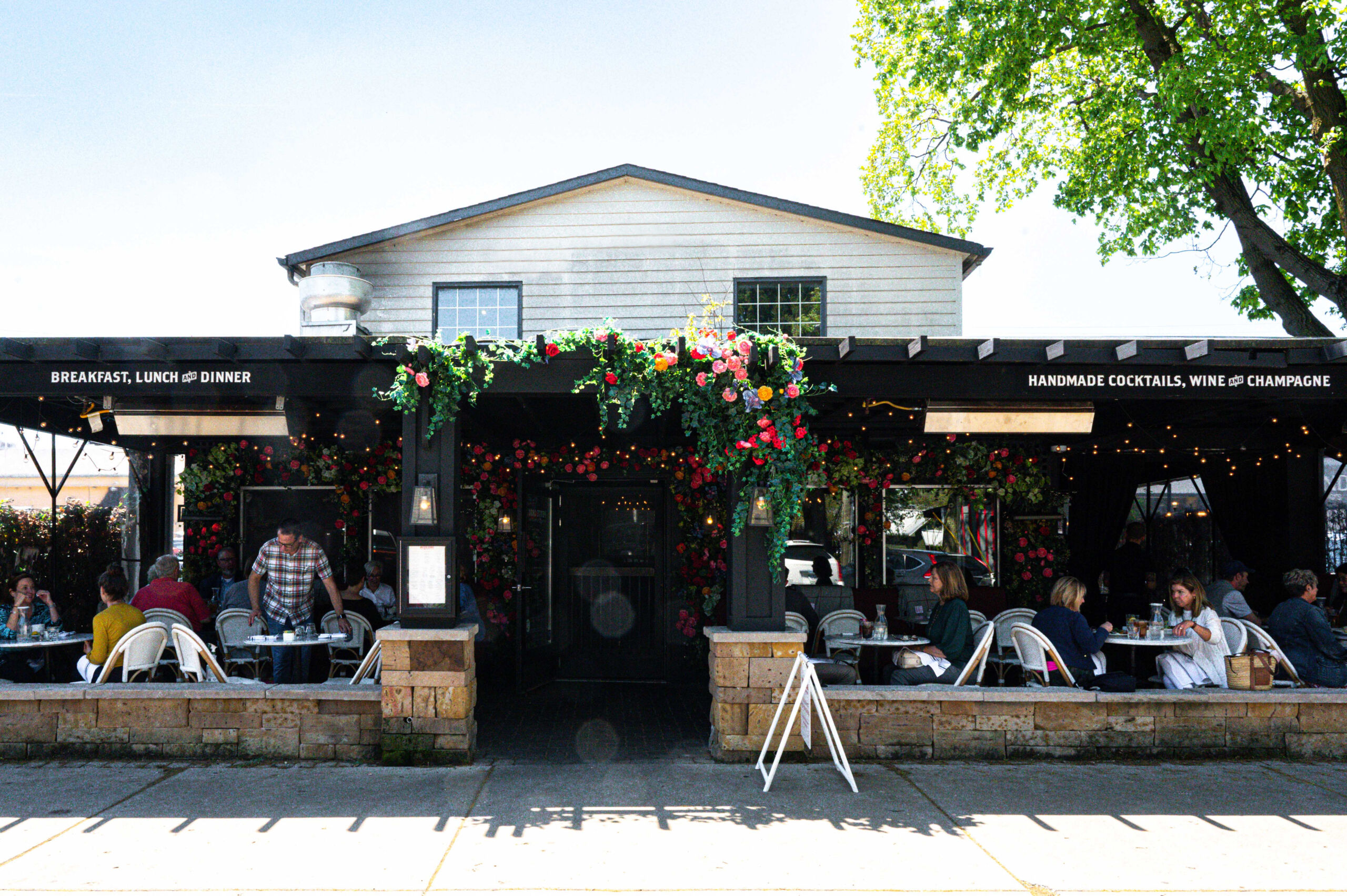 outside of shop with greenery in doorway