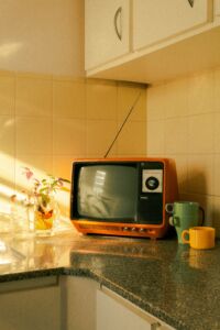 Retro Tv sitting on kitchen counter