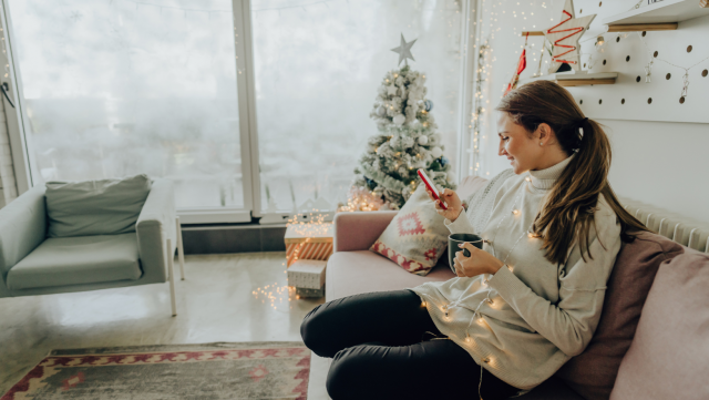 woman on phone at christmas