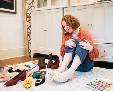 Stephanie Grabow trying on shoes