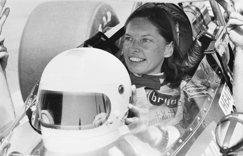 black and white photo of Janet Guthrie during a race