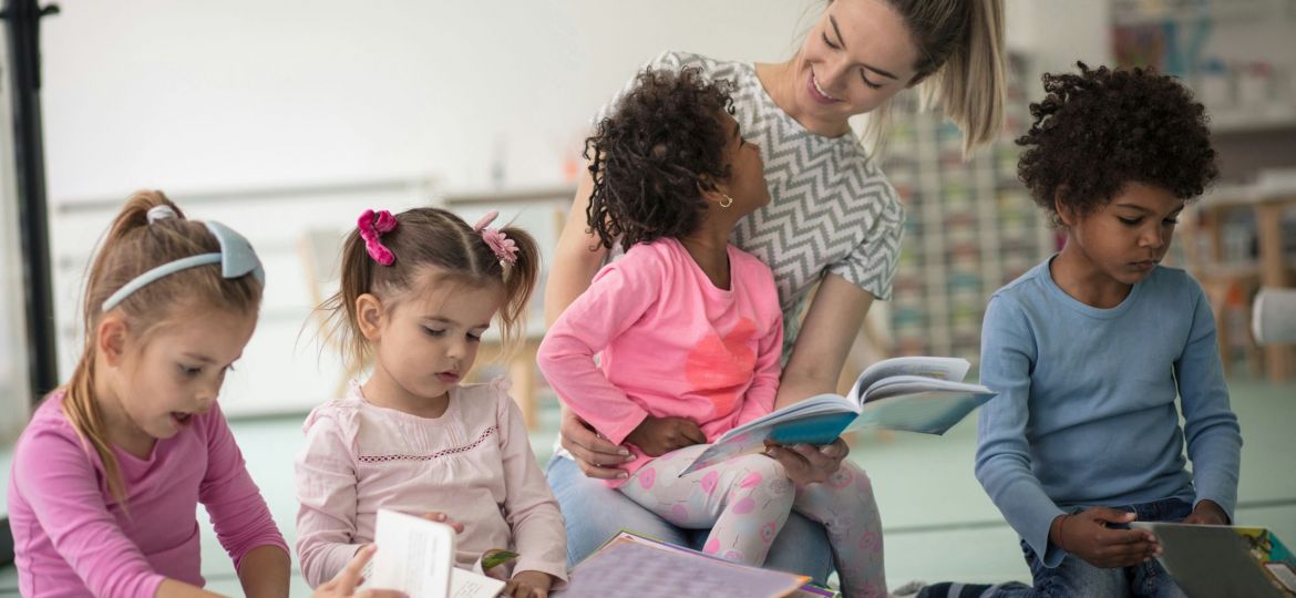 Woman reading to kids.