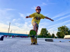 Scout Katta on a skateboard.