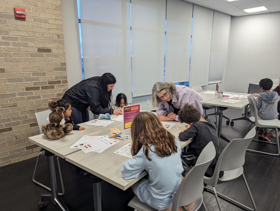 WFYI team members working with kids