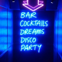 neon sign: Bar, Cocktails, Dreams, DIsco, Party