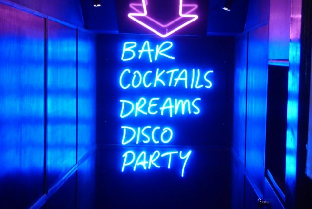 neon sign: Bar, Cocktails, Dreams, DIsco, Party