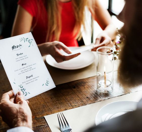 Someone looking at a menu.