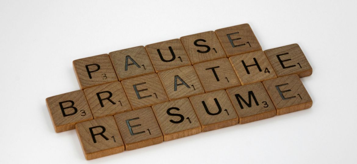 Scrabble Letters that spell out PAUSE, BREATHE, and RESUME.