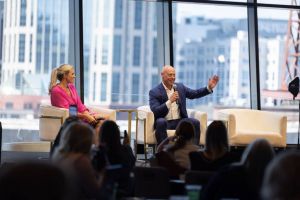 Holly Meyer Lucas with SoFi EVP, Eric Schuppenhauer
