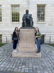 Sippin' Sangria standing with a statue in Boston