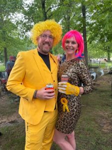 Liz Lemon dressed up with a hot pink wig for Ms. Lake Lemon 2025