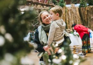 a mom and her son at Jingle Rails